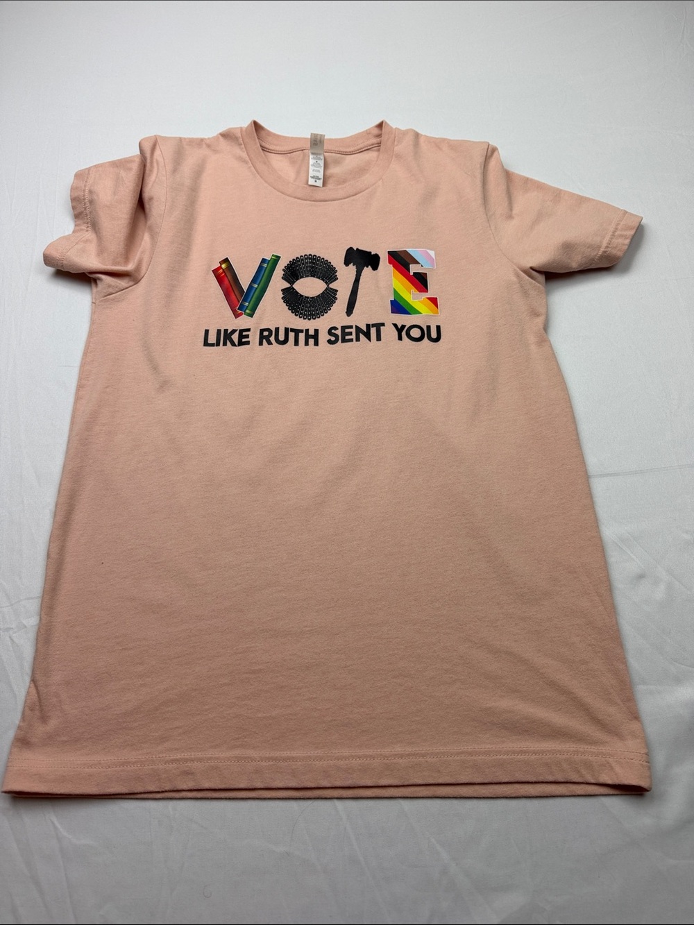 Bella Canvas Peach Short Sleeve Tee with Multicolor 'VOTE' Graphic